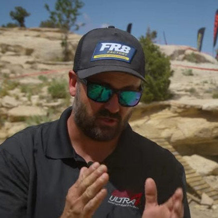 AreaBFE Beatdown racer wearing the FR8 Factory black & grey camo trucker hat