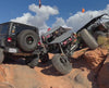 King of the Hammers overlander demo video in off-road obstacle course maneuvering around off-road trucks 